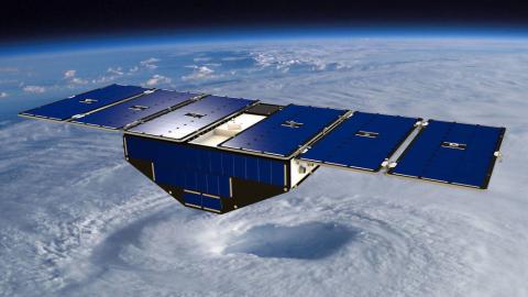 Artist’s concept of one of the eight Cyclone Global Navigation Satellite System satellites deployed in space above a hurricane. Image Credit: NASA
