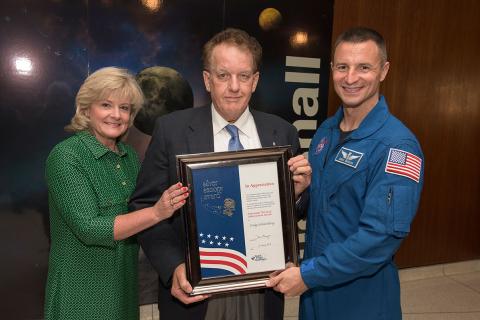 Craig Schulenberg (center) was honored with the NASA Silver Snoopy award, presented by Astronaut Andrew Morgan and Jody Singer, Deputy Director, MSFC.  Photo Credit: Fred Deaton, Marshall Space Flight Center