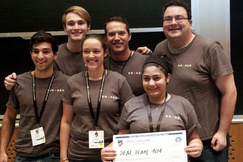 One of three Draper teams at HackTheMachine Boston. Draper provides cyber security capabilities to commercial, government and non-profit customers increasingly concerned about evolving cyber threats.