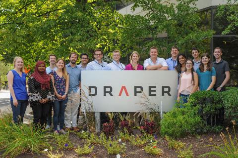 Dr. Jason Holder (10th from left) advised a high summer internship team, which included four high school and one college student working on  “Phage Hunting for Better Bacterial Diagnostics.”