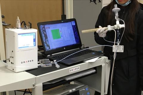 Draper's solution for rapid diagnosis of invasive aspergillosis integrates the company’s microAnalyzer (top left) with a pressure sensor and breath sampling tube.
